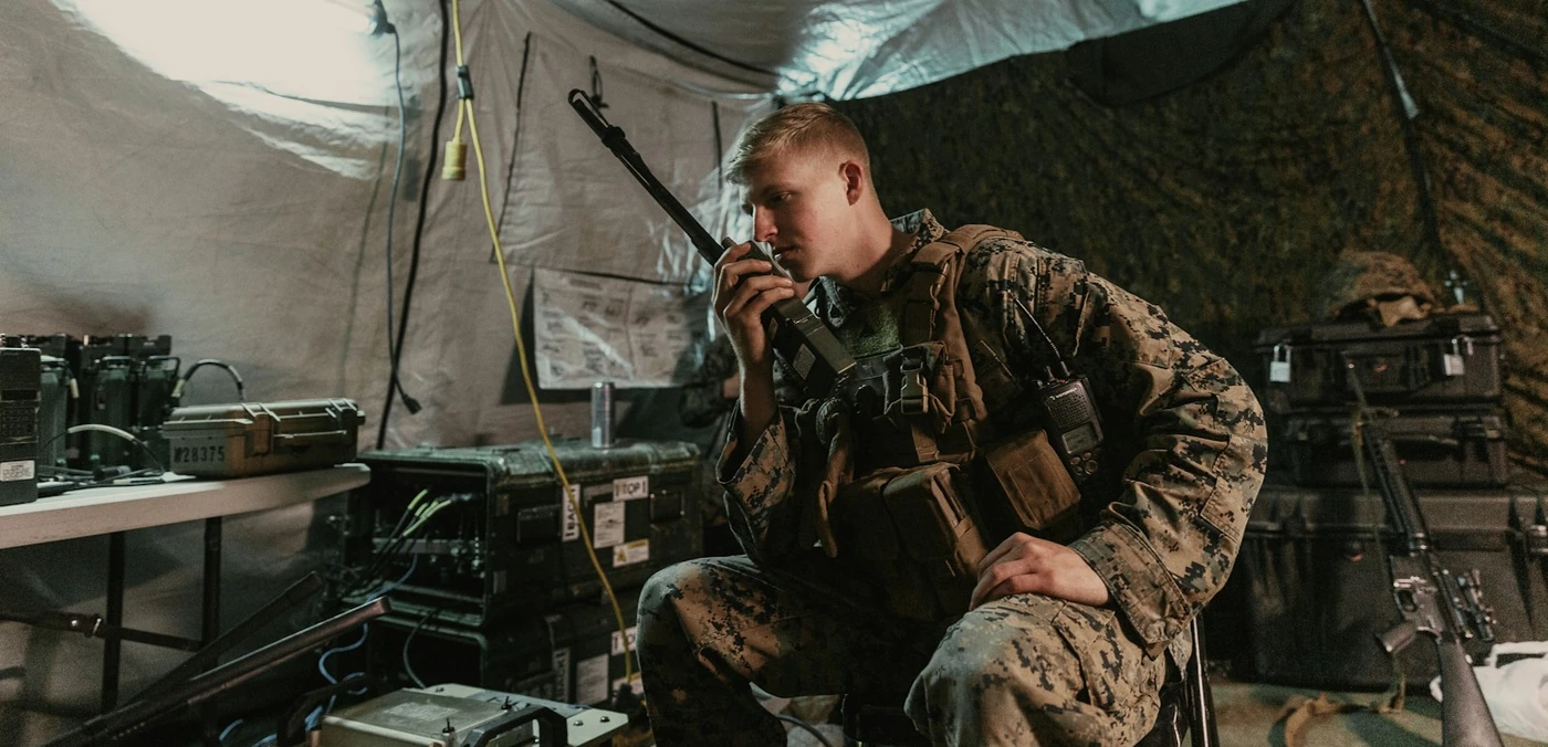 Radio operator performing a communications check