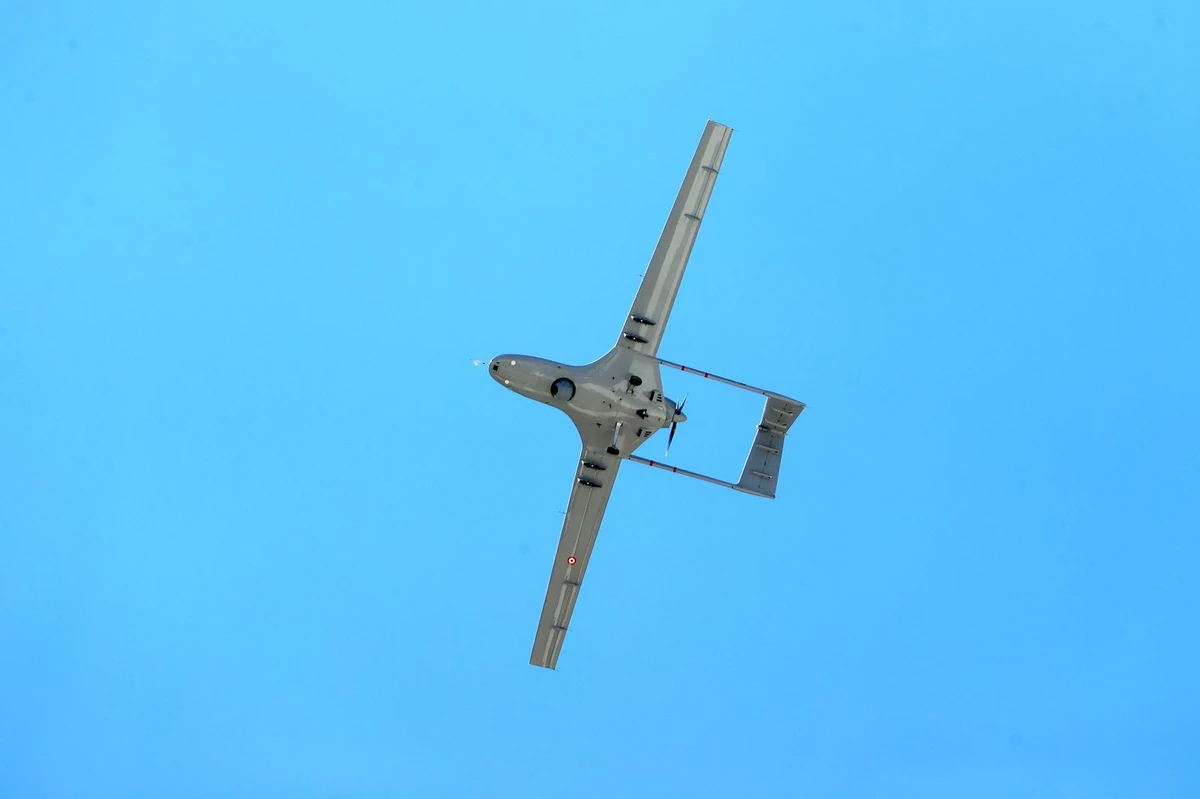 Fixed-wing unmanned aircraft in flight
